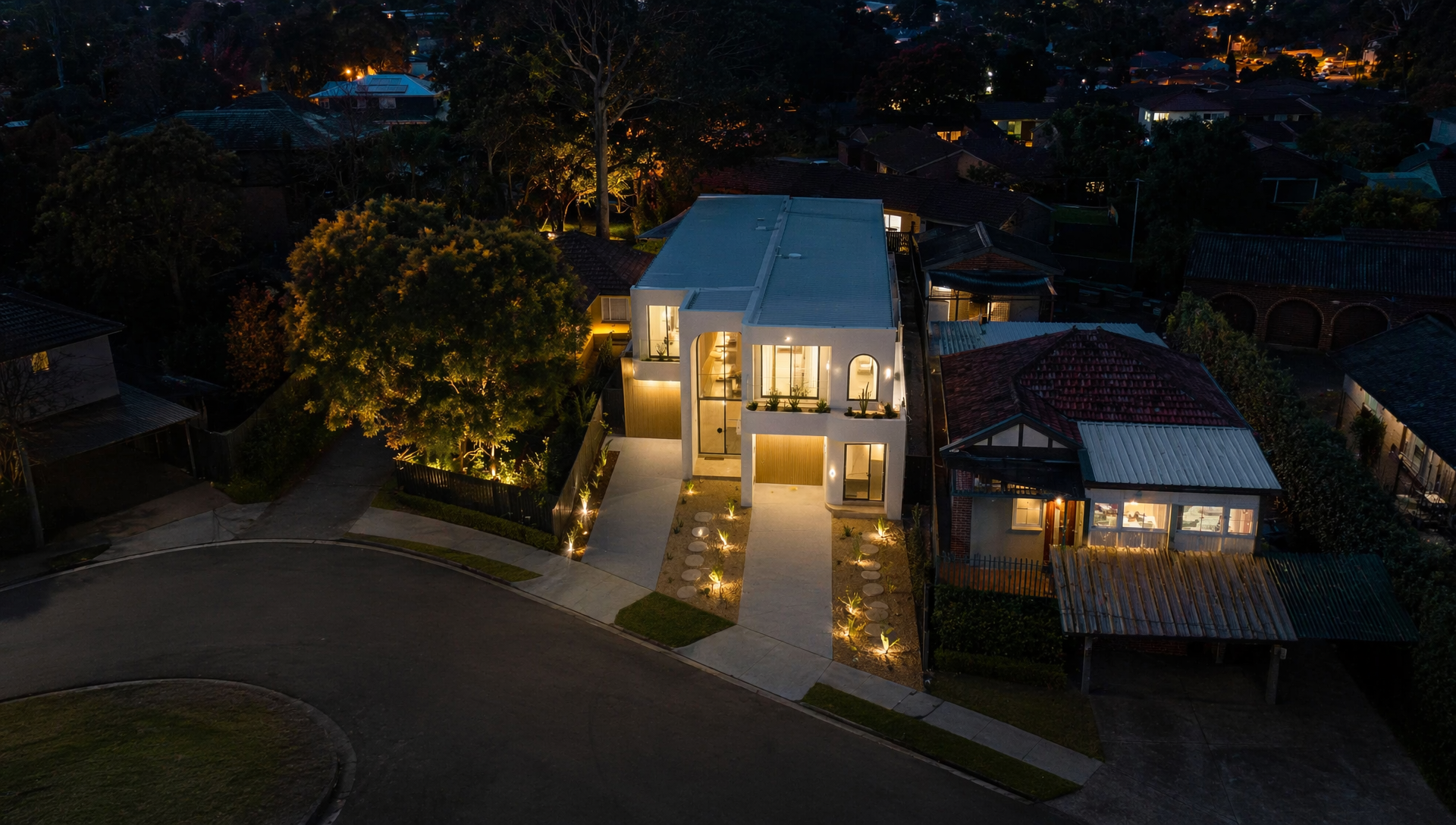 The Jewel on Atkins — architectural exterior at dusk